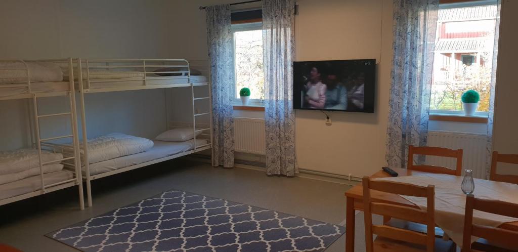 Postel nebo postele na pokoji v ubytování Torsby Vandrarhem