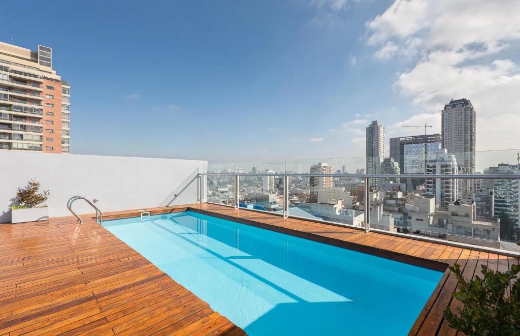 a swimming pool on the roof of a building at Excepcional Departamento en Nuñez in Buenos Aires