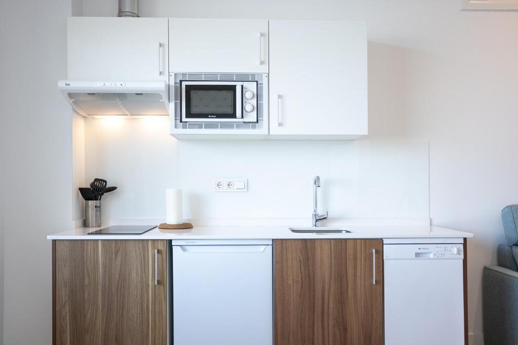 Kuchyňa alebo kuchynka v ubytovaní APARTAMENTOS KRESALA - Vistas al mar