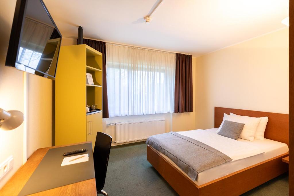 TV a/nebo společenská místnost v ubytování Select Hotel Silence Garden Köln