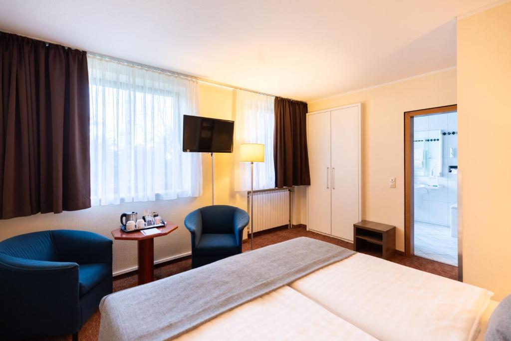 Postel nebo postele na pokoji v ubytování Select Hotel Silence Garden Köln