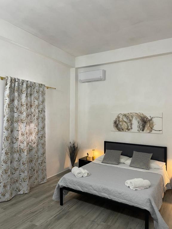 Postel nebo postele na pokoji v ubytování B&B Melissa
