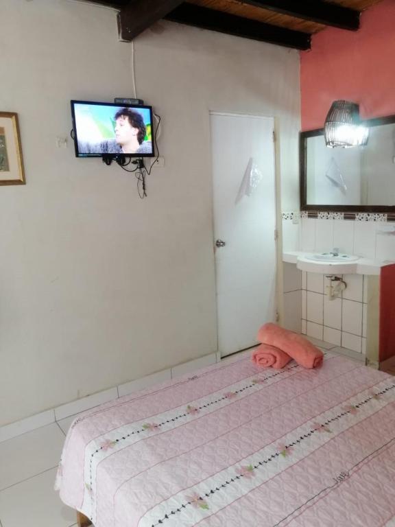Postel nebo postele na pokoji v ubytování Punta Pacífico Bungalows Máncora