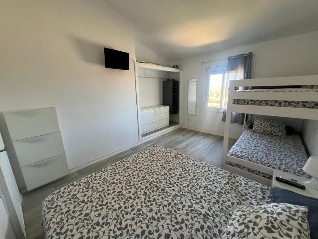 Postel nebo postele na pokoji v ubytování Apartamento Cala Piques
