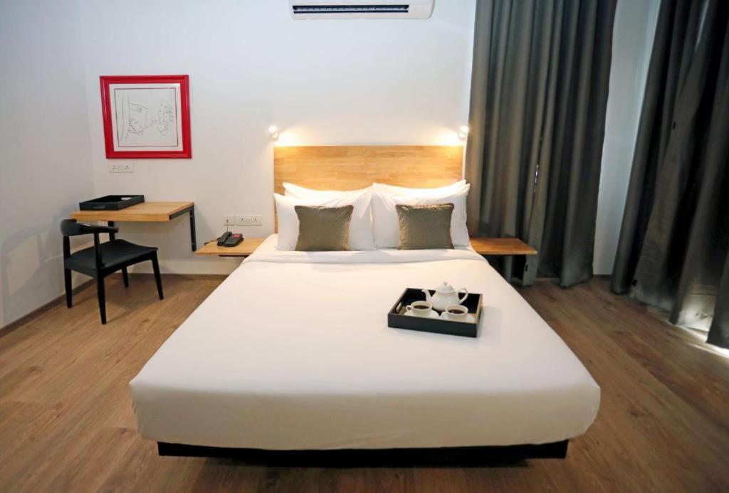 Postel nebo postele na pokoji v ubytování Hotel Wedlock 38