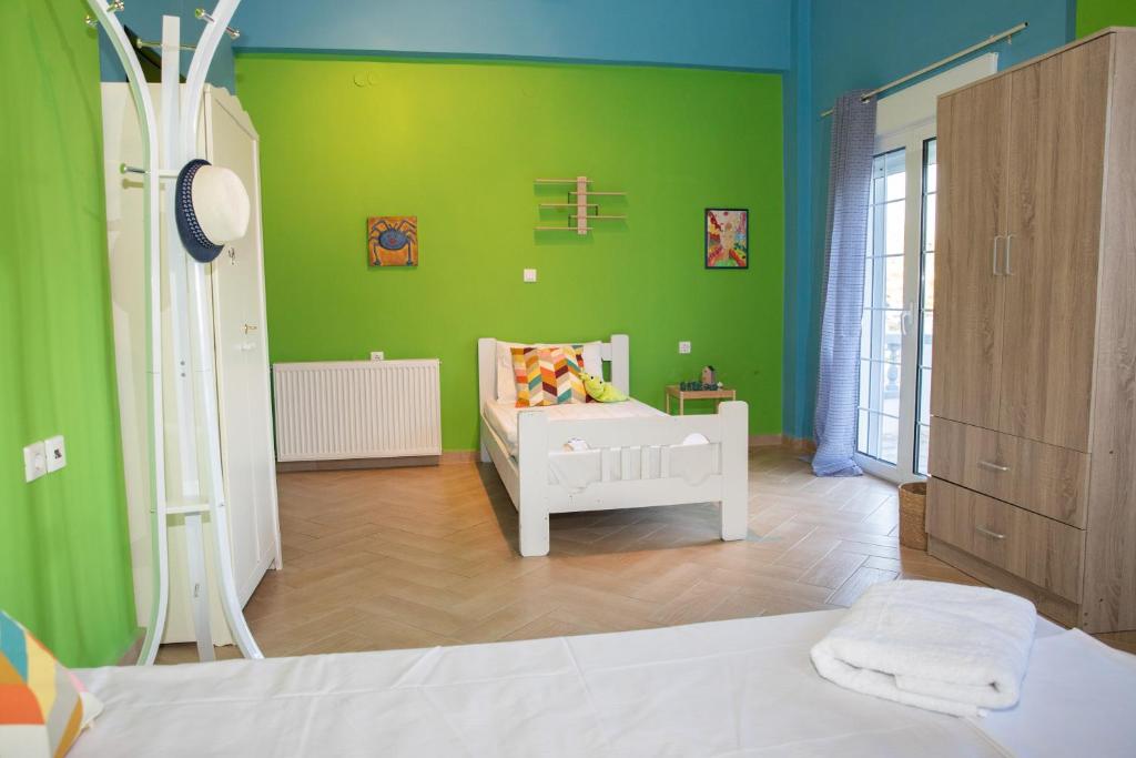 Postel nebo postele na pokoji v ubytování Emerald Heaven