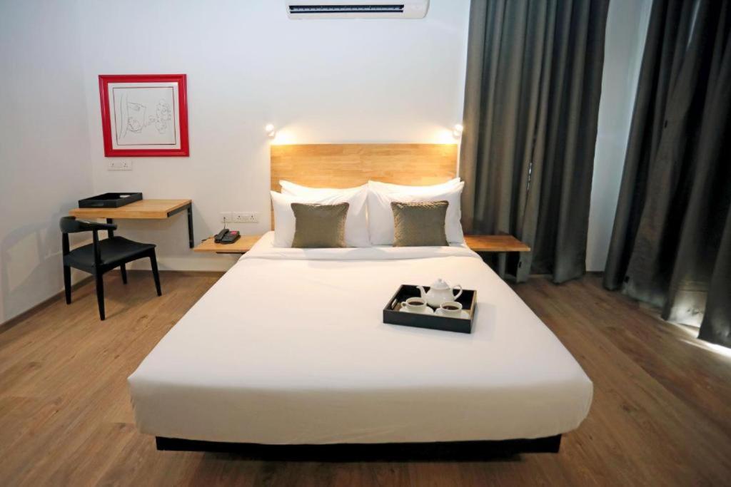 Postel nebo postele na pokoji v ubytování Hotel Wedlock 38
