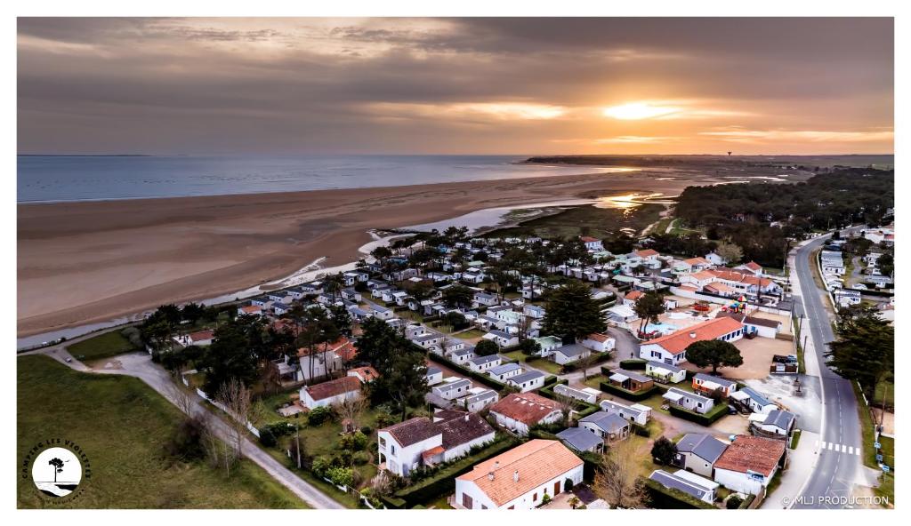 an aerial view of a town next to the beach at Camping Les Violettes in La Faute-sur-Mer