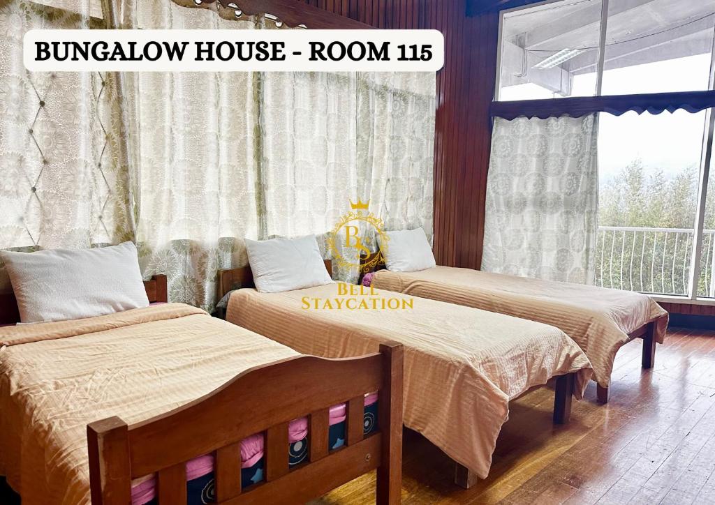 Postel nebo postele na pokoji v ubytování Baguio BELL Staycation