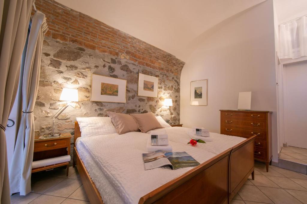 Postel nebo postele na pokoji v ubytování Casa Tamè - Happy Rentals