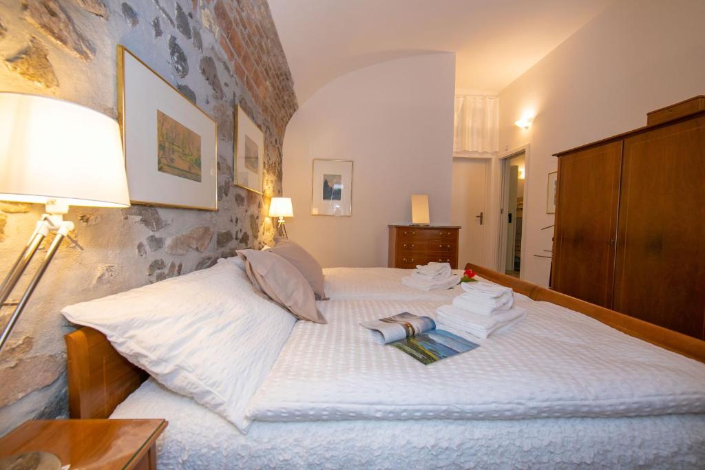 Postel nebo postele na pokoji v ubytování Casa Tamè - Happy Rentals
