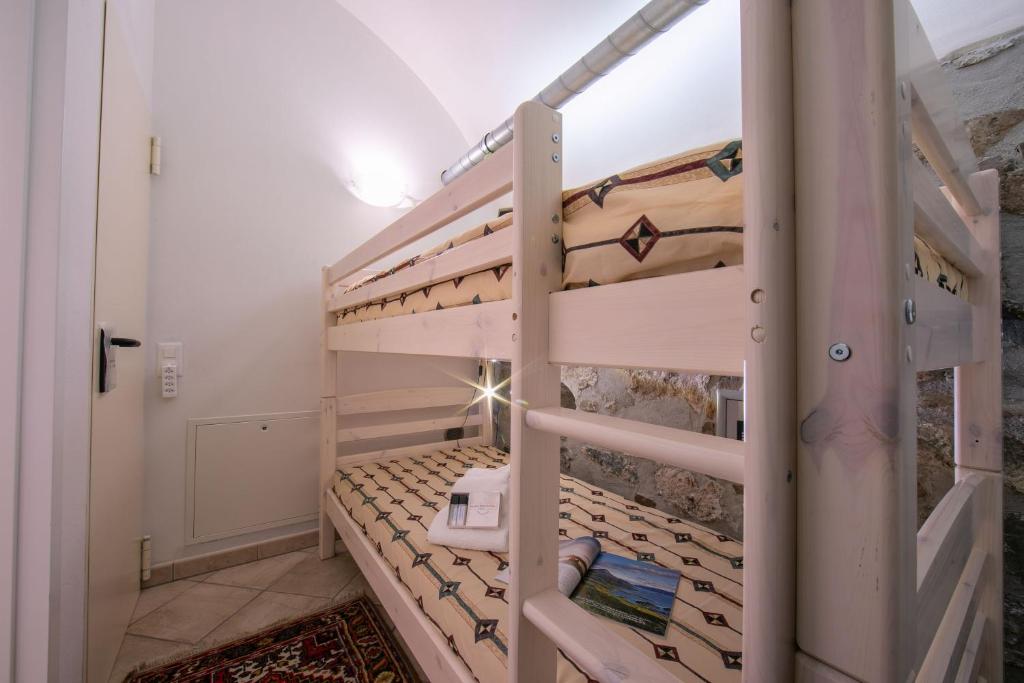 Palanda nebo palandy na pokoji v ubytování Casa Tamè - Happy Rentals