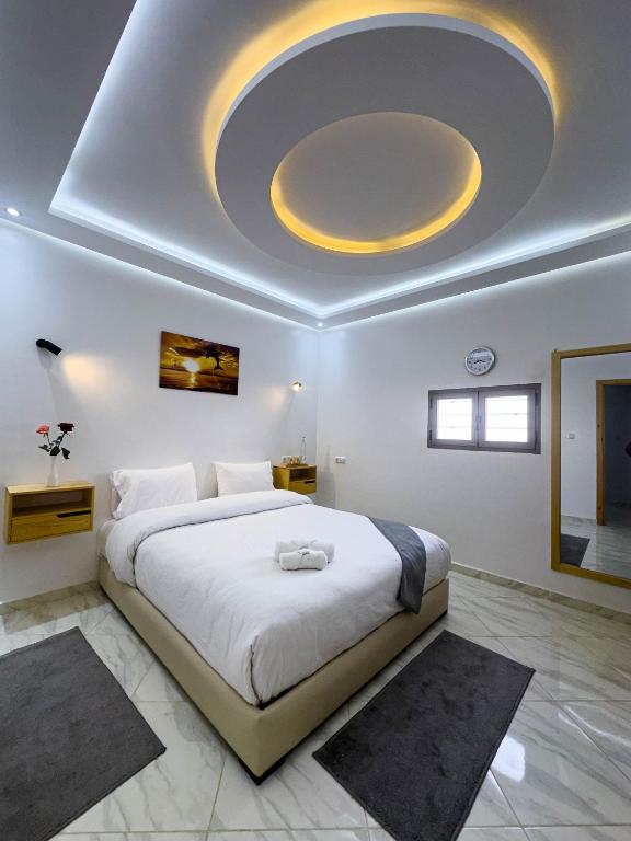 Postel nebo postele na pokoji v ubytování Hotel apartment america