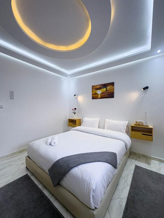 Postel nebo postele na pokoji v ubytování Hotel apartment america
