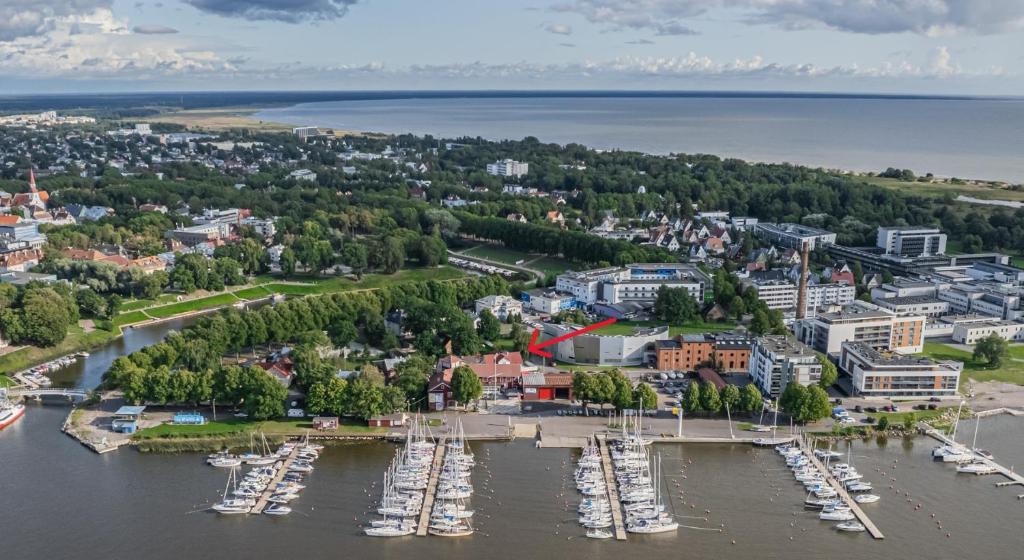 an aerial view of a harbor with boats in the water at Villa Elisabeth Apartments in Pärnu