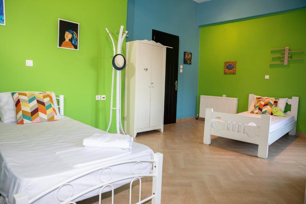 Postel nebo postele na pokoji v ubytování Emerald Heaven