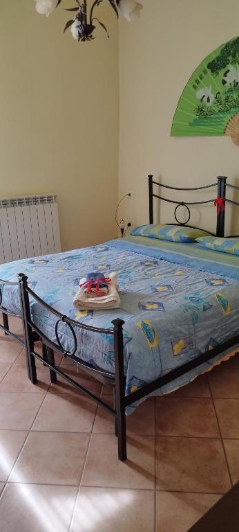 Postel nebo postele na pokoji v ubytování LA STREGA UBRIACA