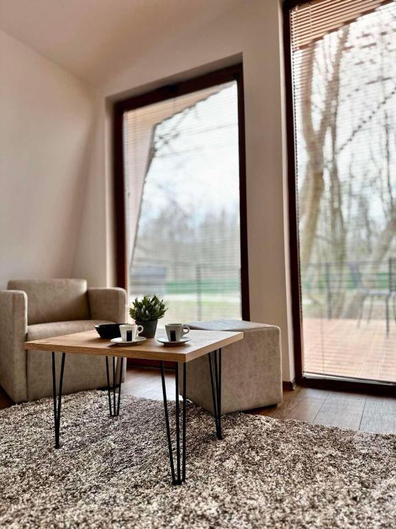 Posezení v ubytování Blisku do Gradot - Riverfront Luxury Cabins