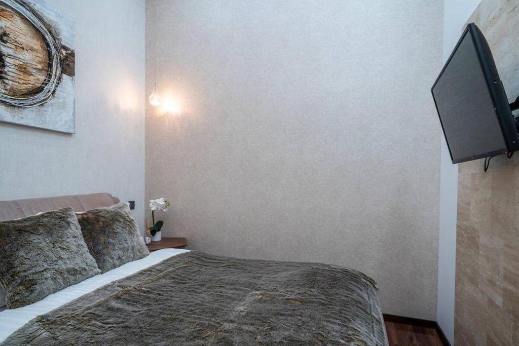 Posteľ alebo postele v izbe v ubytovaní Central Luxy design apartment