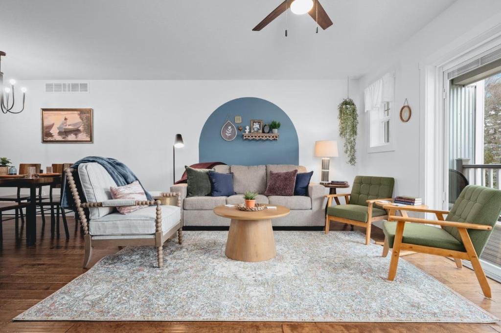 a living room with a couch and chairs at NEW Ivy House 3BR Townhome Downtown Beaches Wineries in Traverse City