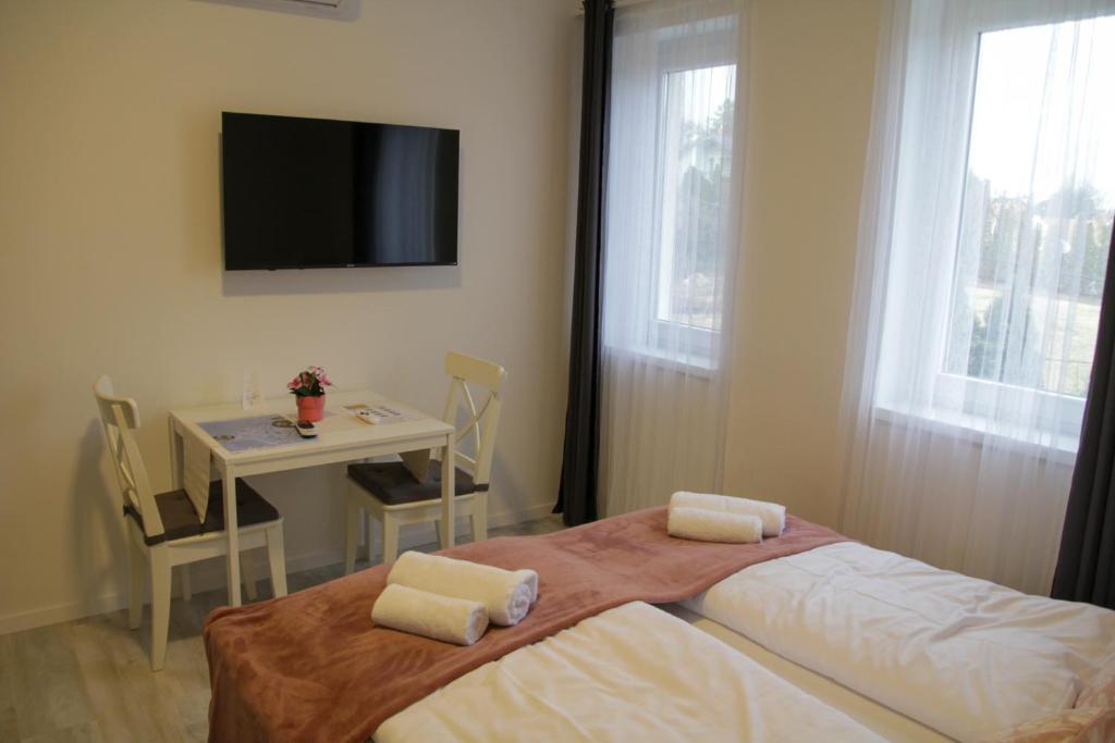 Voodi või voodid majutusasutuse ****Heviz Springs Apartments toas