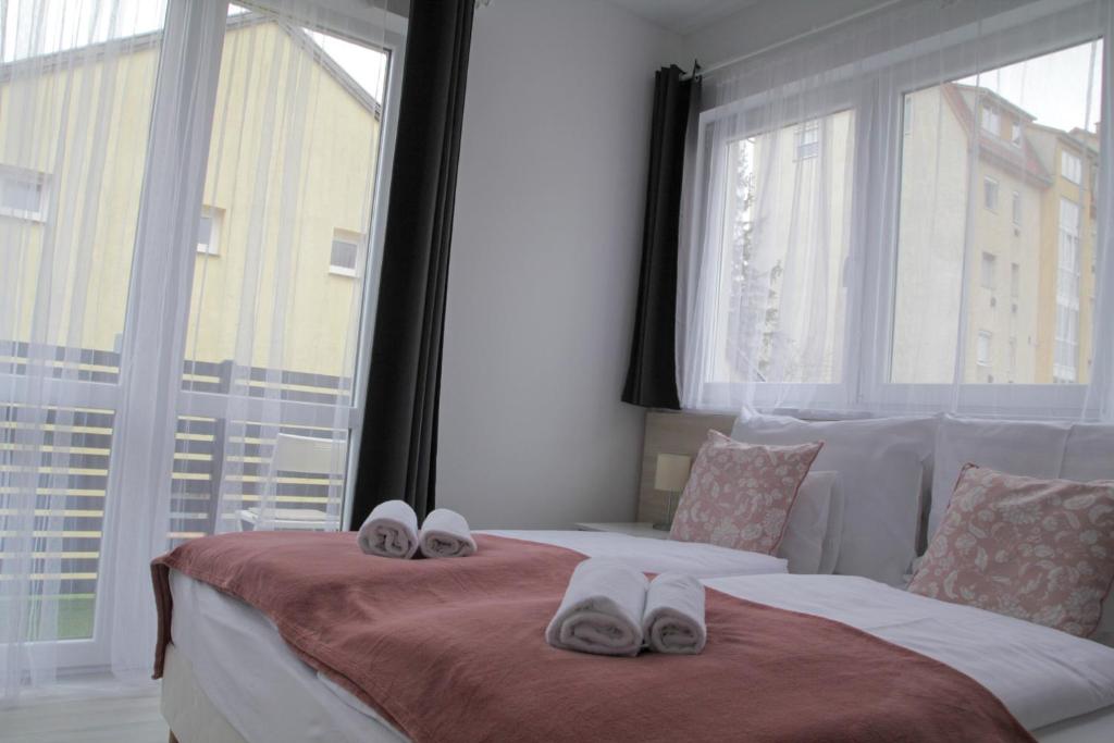 Voodi või voodid majutusasutuse ****Heviz Springs Apartments toas