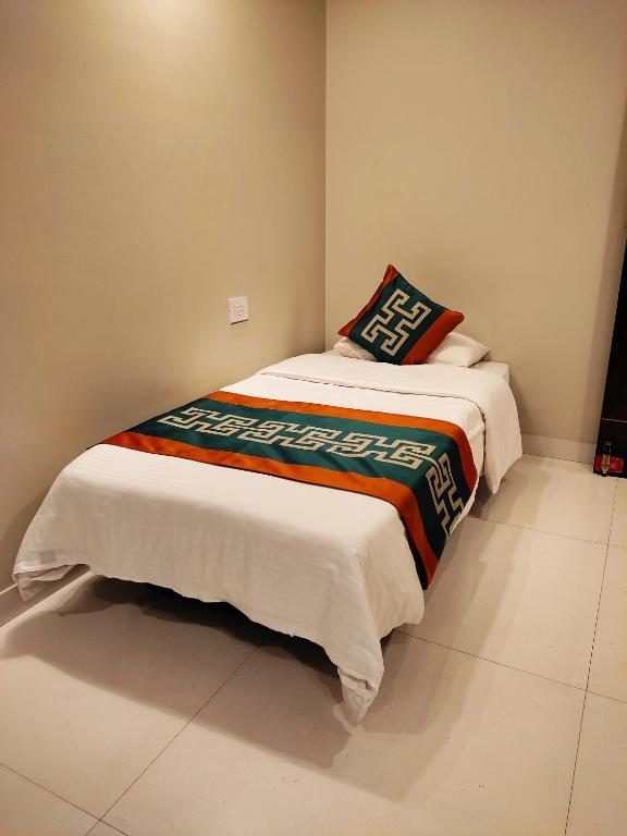 Postel nebo postele na pokoji v ubytování Hotel GRT Square