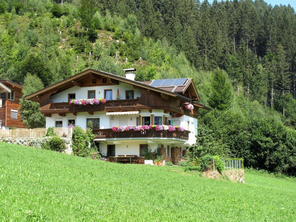 a house on the side of a hill at Apartment Markus - ZAZ760 by Interhome in Mühlfeld