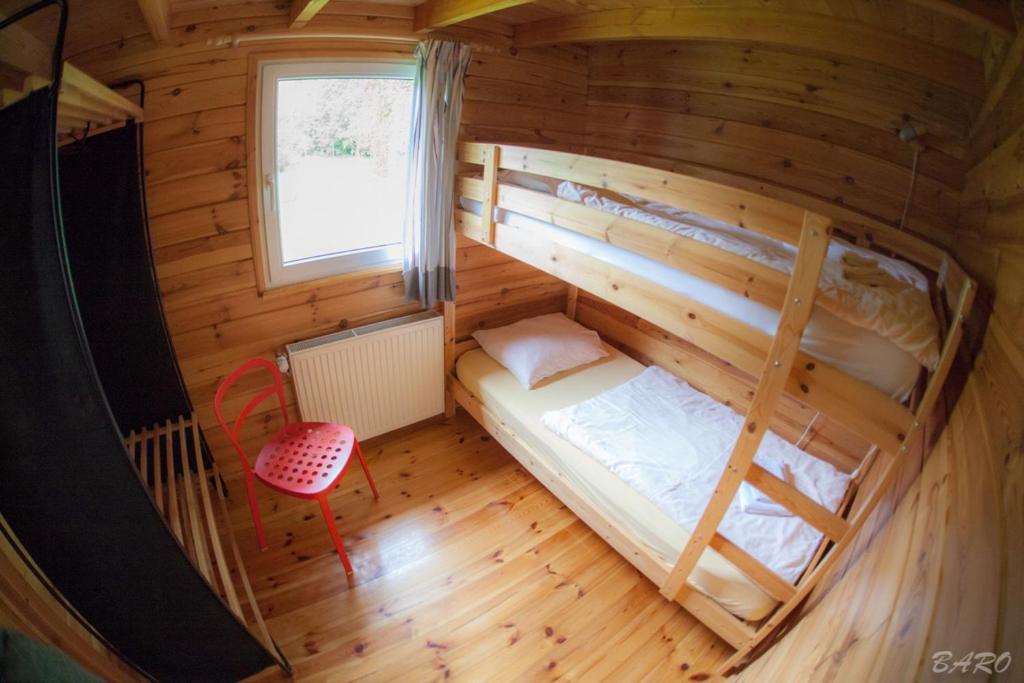 Postel nebo postele na pokoji v ubytování Dirbach Plage Parc