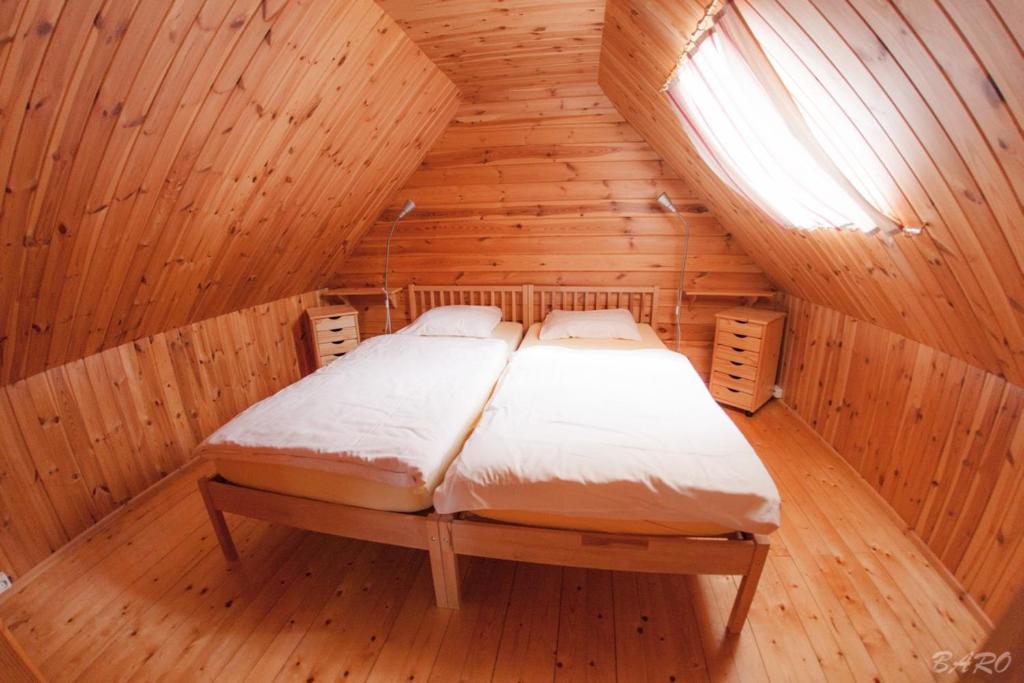 Postel nebo postele na pokoji v ubytování Dirbach Plage Parc