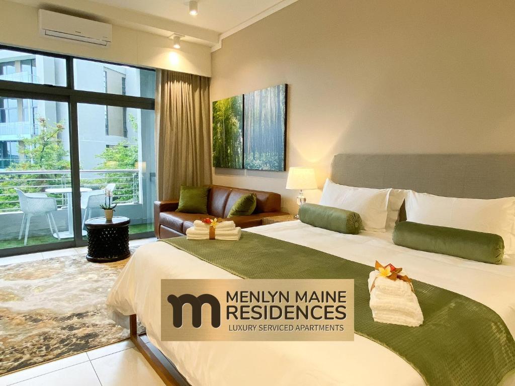 a hotel room with a bed and a large window at Menlyn Maine Residences - Kyoto king size xl bed in Pretoria