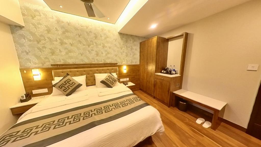 Postel nebo postele na pokoji v ubytování Hotel GRT Square
