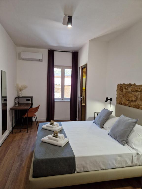 Postel nebo postele na pokoji v ubytování Villa Lekythos