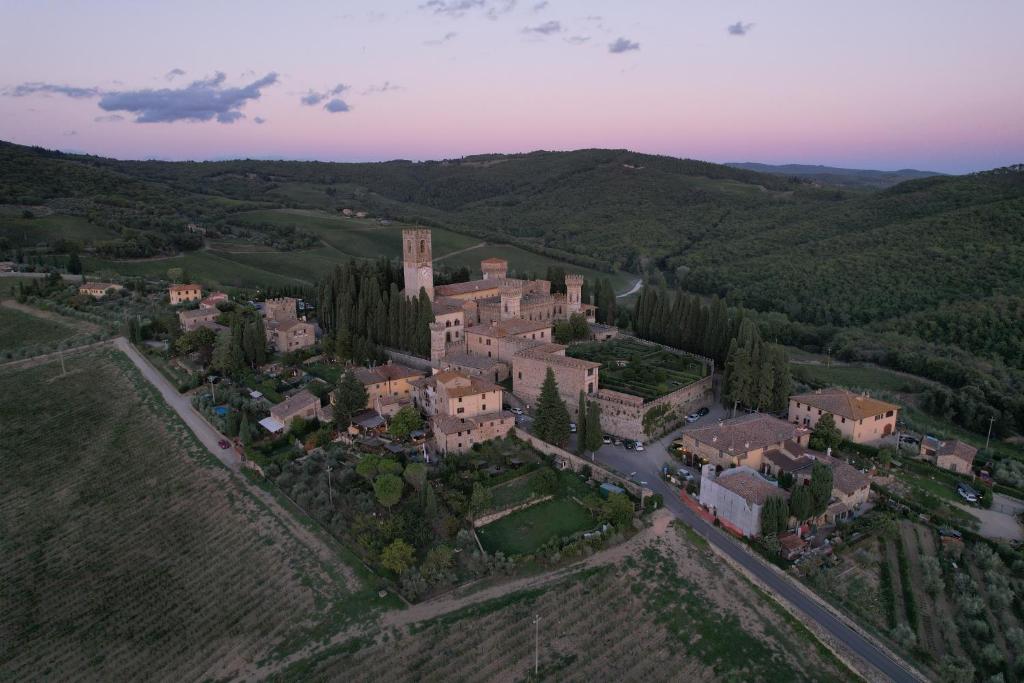 an aerial view of a large estate in the hills at Casa del Viandante Romea del Chianti - Badia a Passignano in Badia A Passignano