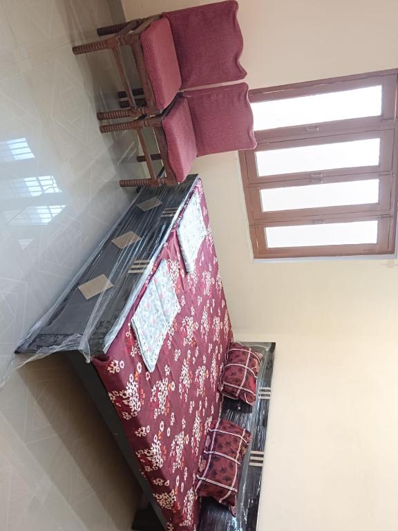 A seating area at Hare Krishna Homestay
