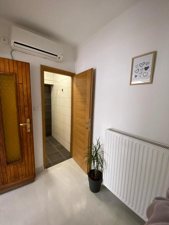 Postel nebo postele na pokoji v ubytování Apartmani Radosav