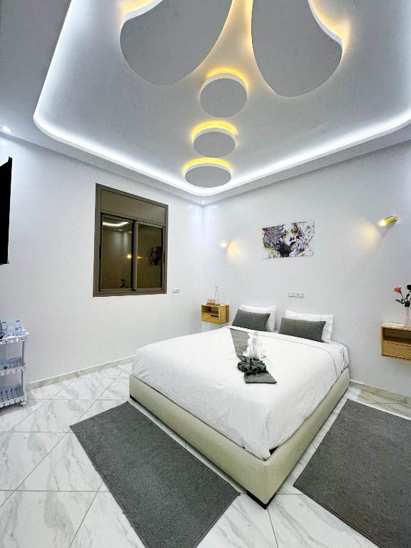 Postel nebo postele na pokoji v ubytování Hotel apartment america