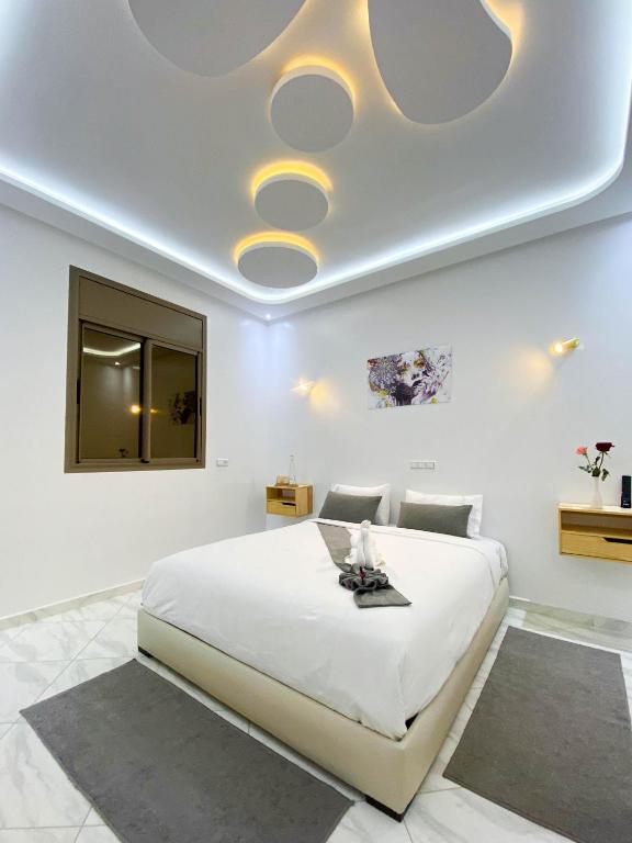 Postel nebo postele na pokoji v ubytování Hotel apartment america