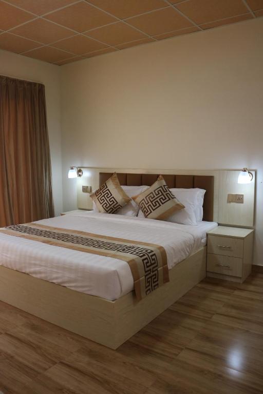 Postel nebo postele na pokoji v ubytování Lina Dreamland Resort