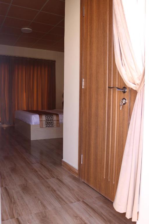 Postel nebo postele na pokoji v ubytování Lina Dreamland Resort