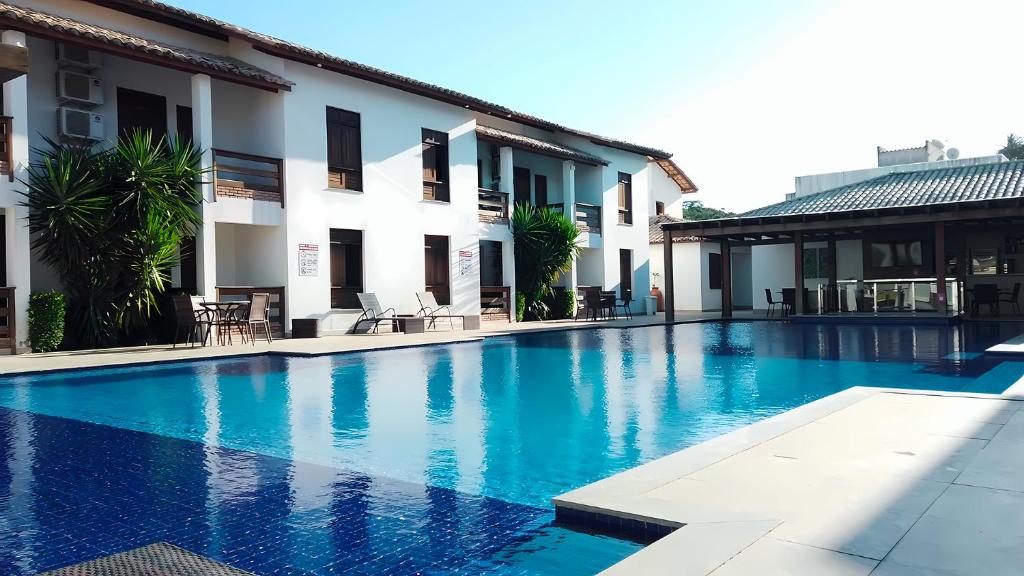 Bazén v ubytování Hotel Encantos de Itaperapuã nebo v jeho okolí