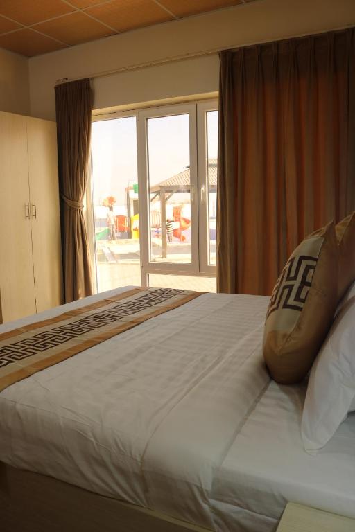 Postel nebo postele na pokoji v ubytování Lina Dreamland Resort