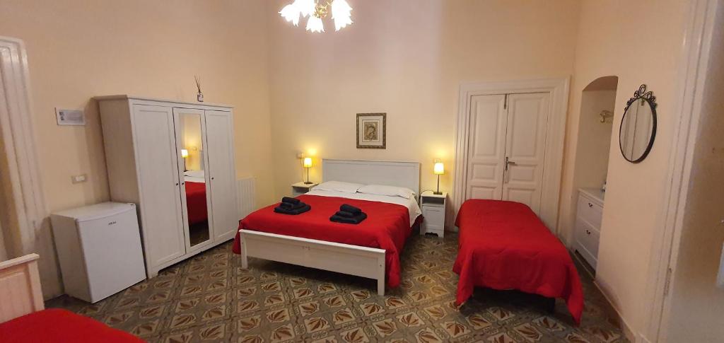 Postel nebo postele na pokoji v ubytování B&B Maricentro