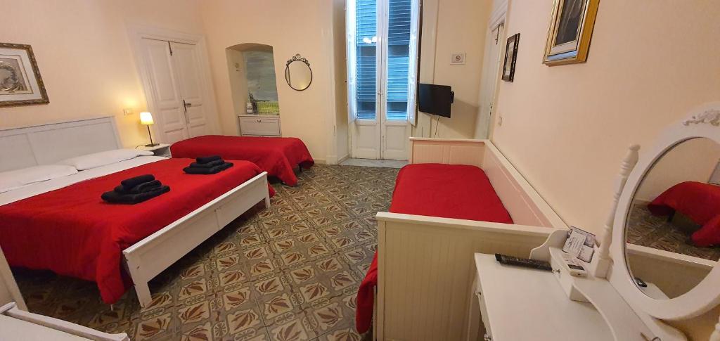 Postel nebo postele na pokoji v ubytování B&B Maricentro