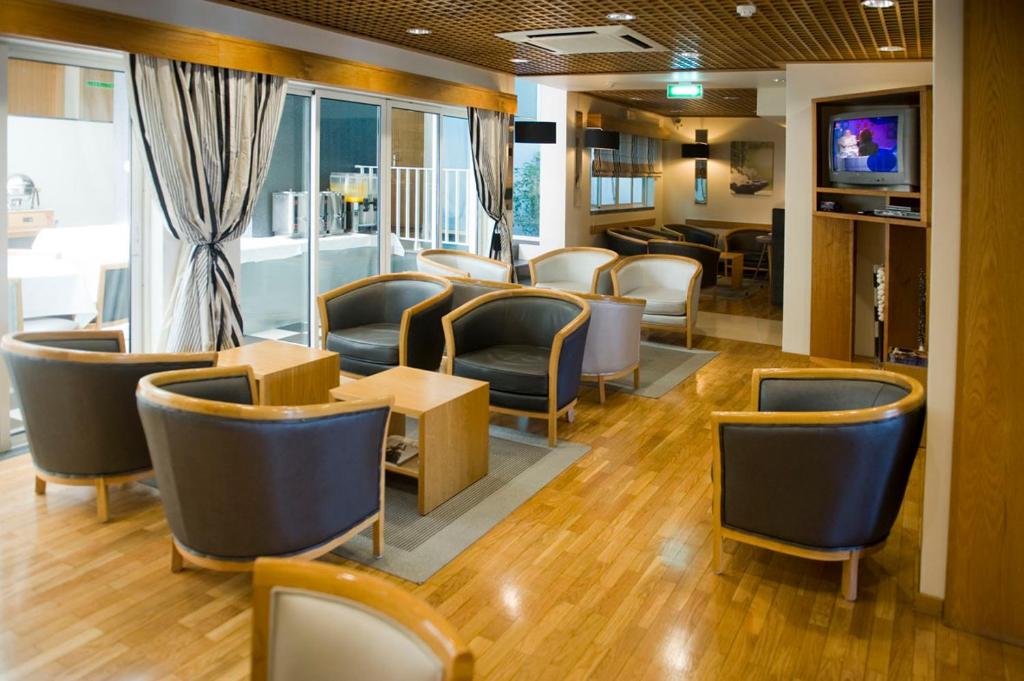 Гостиная зона в Hotel Varandas do Atlântico by RIDAN Hotels
