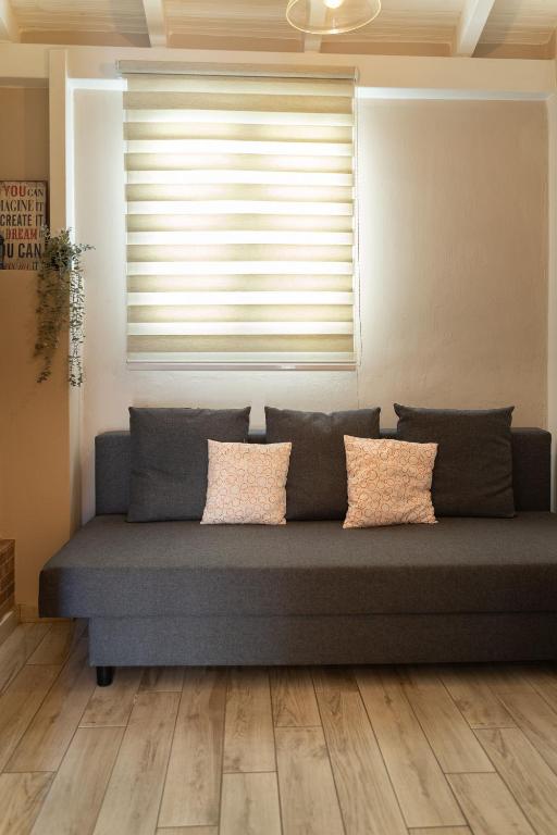 Posezení v ubytování Maisonette Pylos