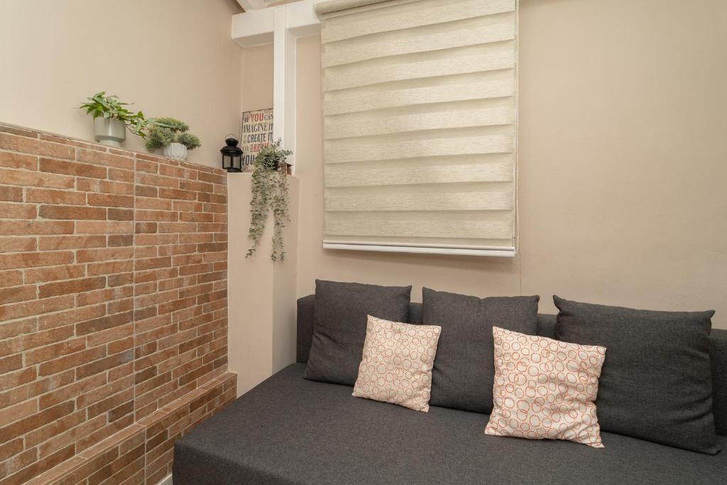 Posezení v ubytování Maisonette Pylos