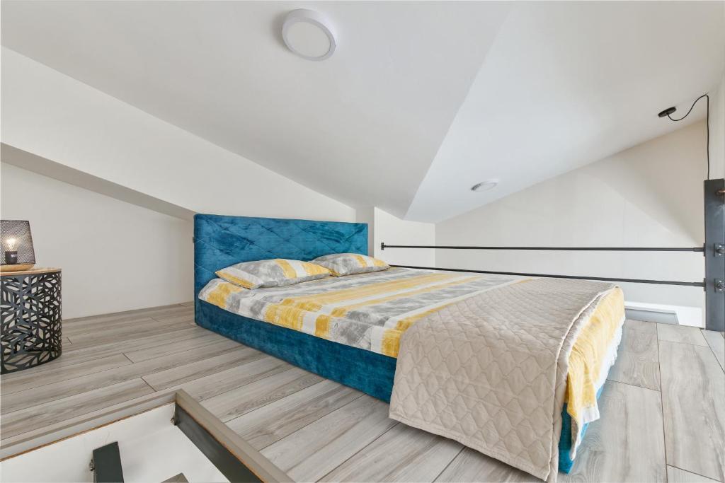 Postel nebo postele na pokoji v ubytování Ell Star 2 Apartment