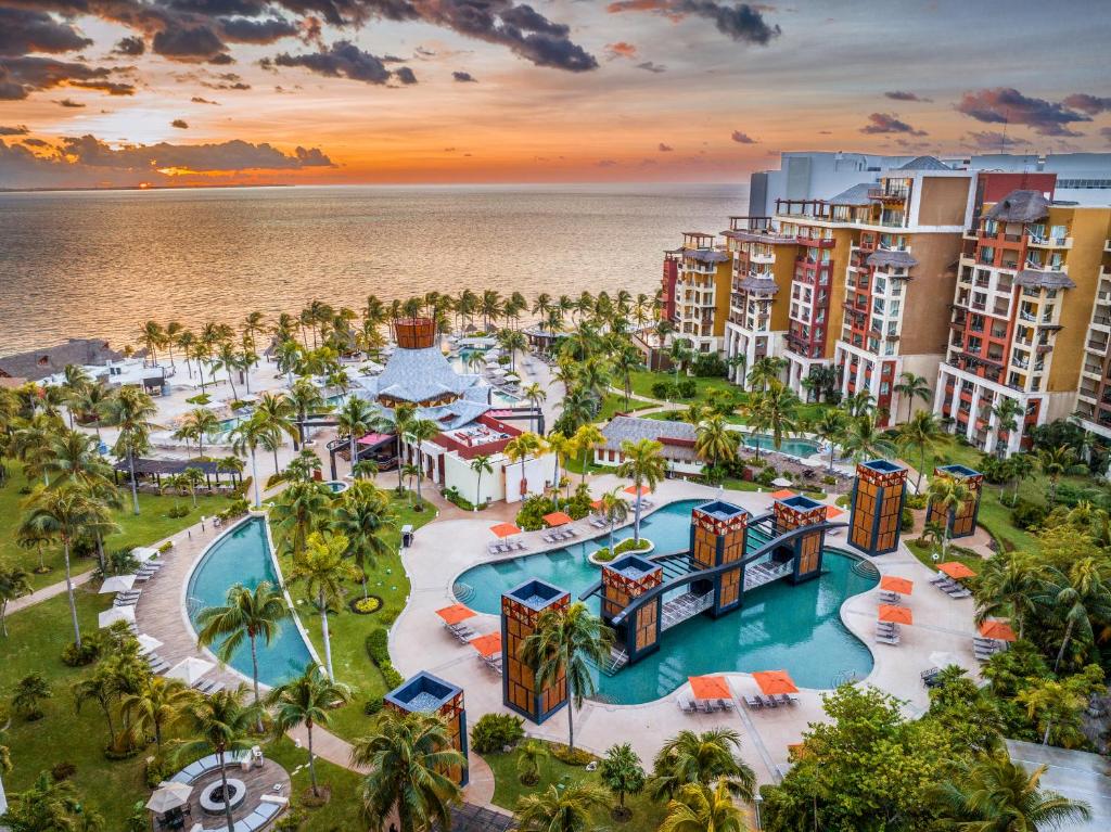 an aerial view of a resort with a swimming pool at Villa del Palmar Cancun Luxury Beach Resort & Spa in Cancún