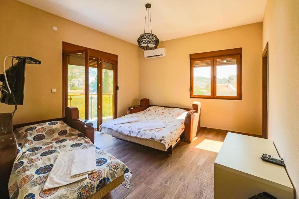 Vuode tai vuoteita majoituspaikassa Apart Hotel XXL Lux